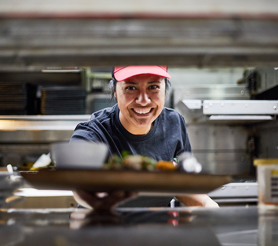 Line cook fulfilling order